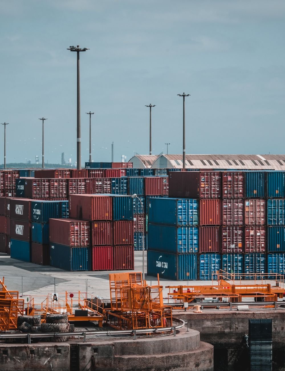 Cargo containers stacked at an Indian export port